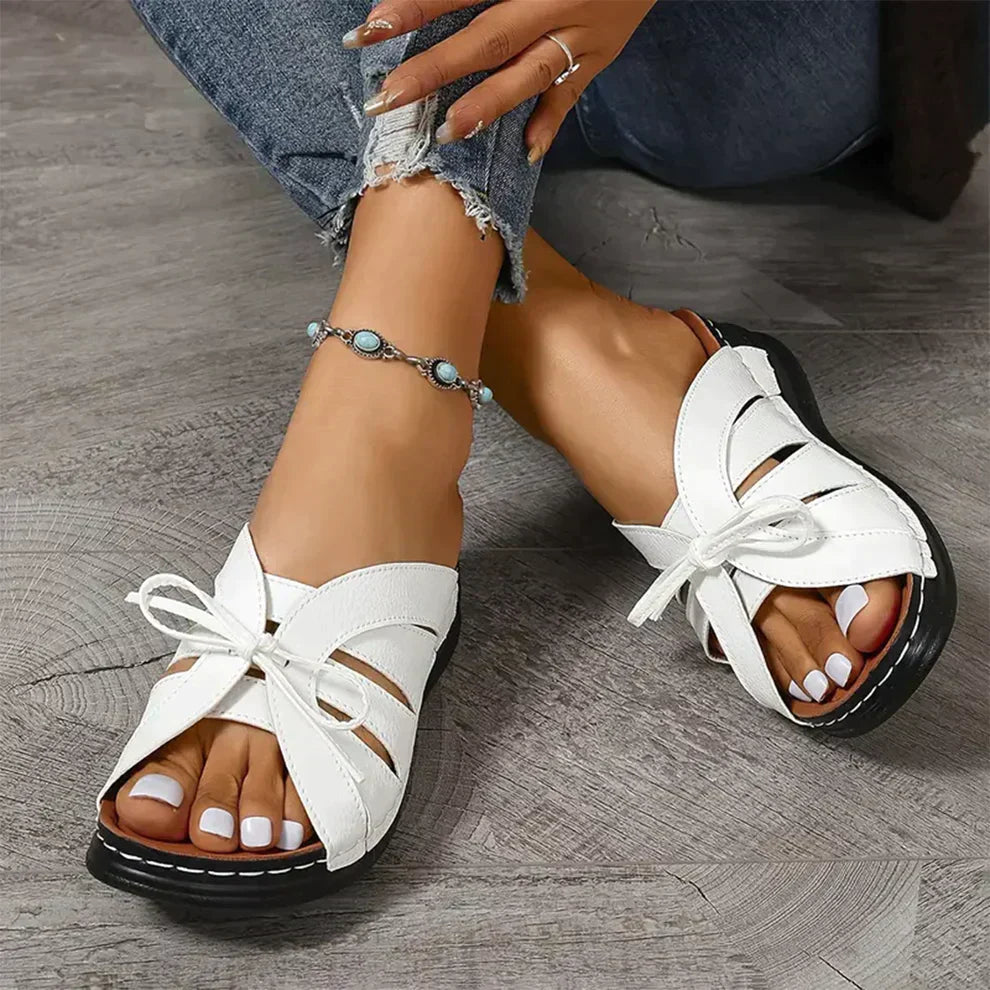 Orthopaedic wedge sandals with a domed button – Mirella