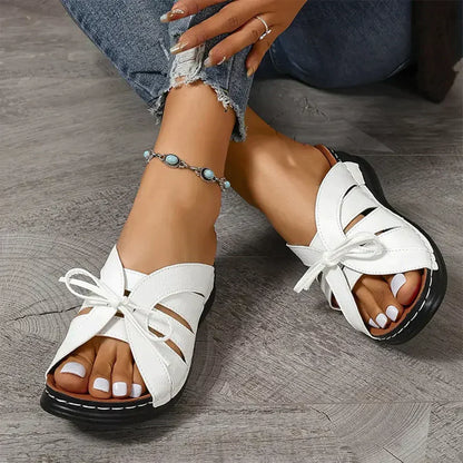 Orthopaedic wedge sandals with a domed button – Mirella