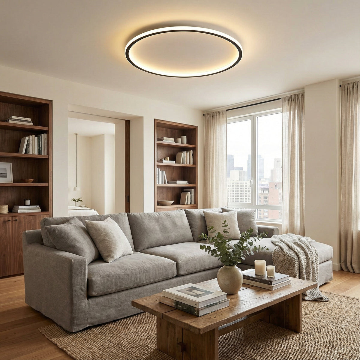 Ring light glowing warmly over a living room with a grey sofa, wooden shelves and a rustic coffee table. 4