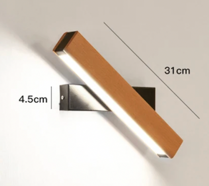 Longer wooden light with a black base, turned at an angle, with size markings of 31cm and 4.5cm. 5