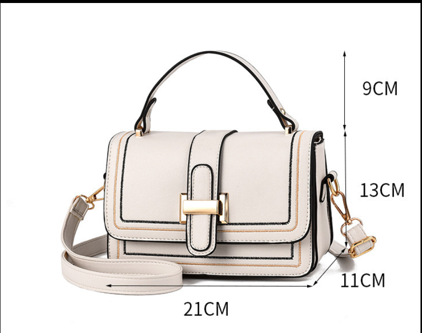 Front view of the cream bag with lines marking its height, handle drop, depth and width in centimetres. 9