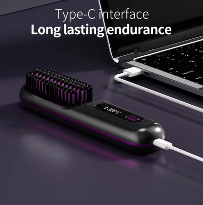 Black brush lying flat with a charging cable plugged into its end and the other end connected to a laptop. 6
