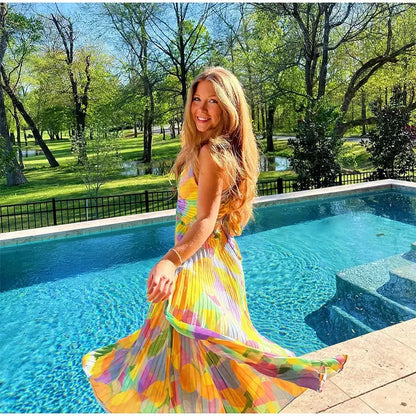 Printed summer dress with plunging neckline and bow detail – Vivienne