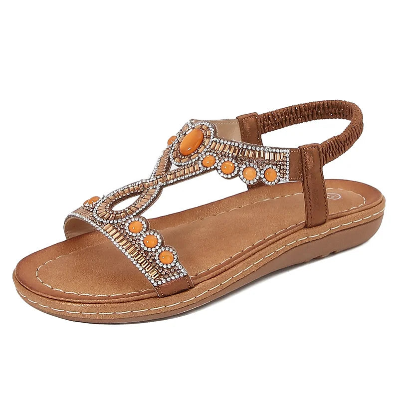 Fashionable women's sandals with rhinestones and glitter – summer shoes for parties and leisure.