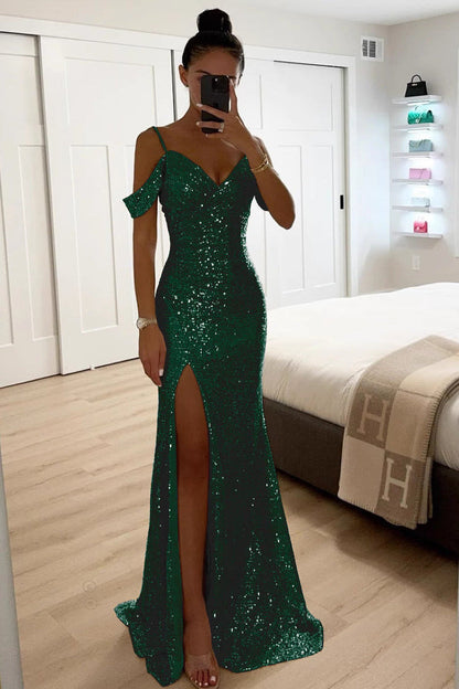 Model in the emerald green sequin version, with drop off-shoulder sleeves and a high slit 3