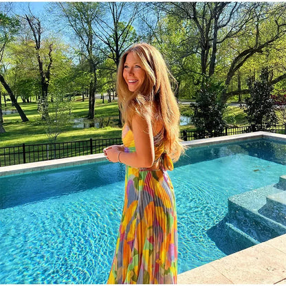Printed summer dress with plunging neckline and bow detail – Vivienne