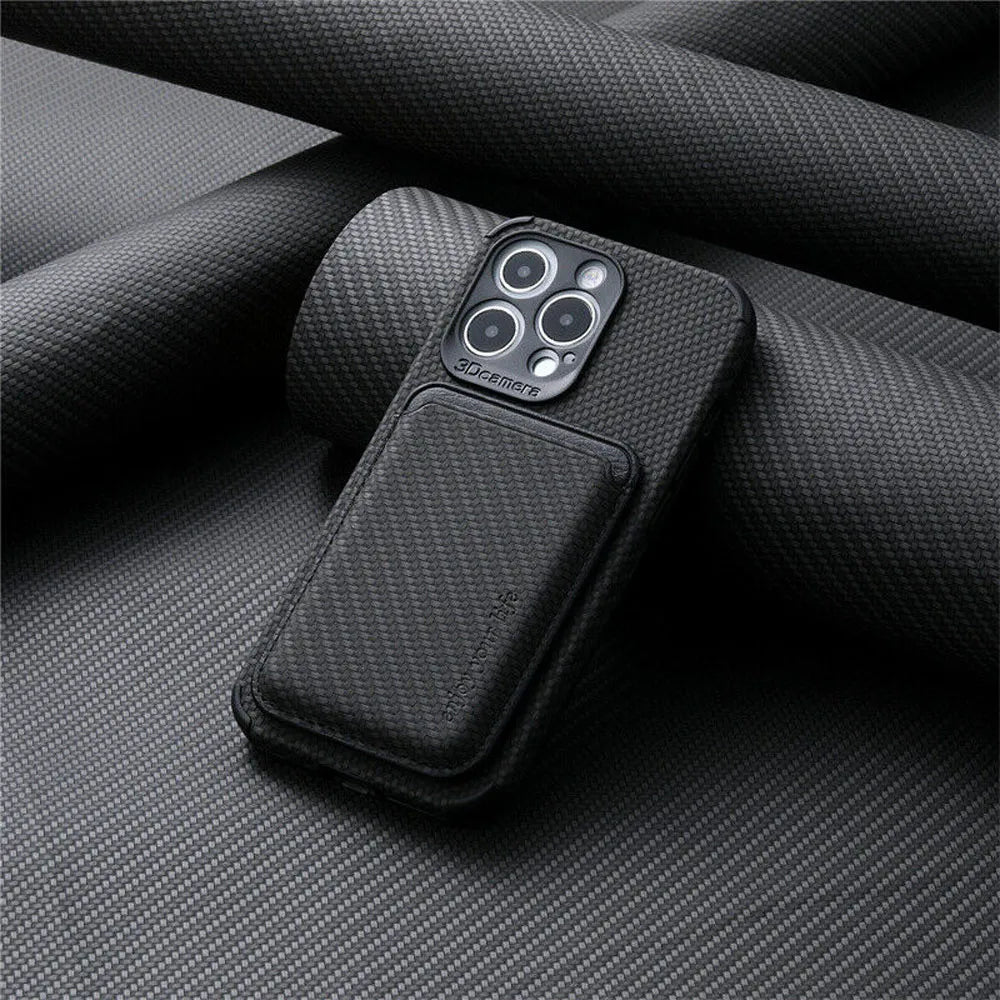 Black case with the card wallet attached, leaning against rolled dark woven fabric 3