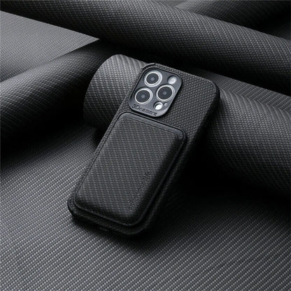 Black woven-texture case with card pocket attached, resting against rolled dark fabric 4