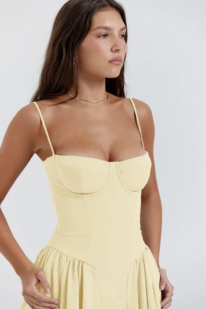 Stylish summer dress with spaghetti straps and a waist cinch – Mira