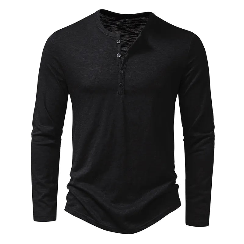 Black long-sleeved Henley with four buttons and a subtle slub texture, shown flat from the front. 16