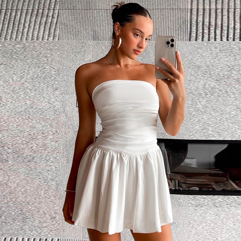 White strapless mini dress with plissé details – Nikki