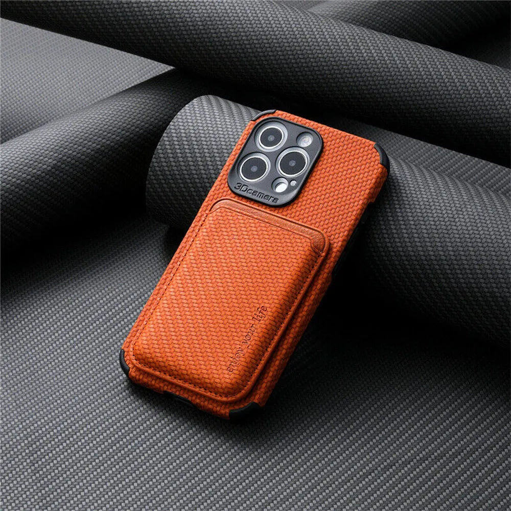 Orange woven-texture case with attached card wallet and black corner bumpers, resting on dark fabric 4