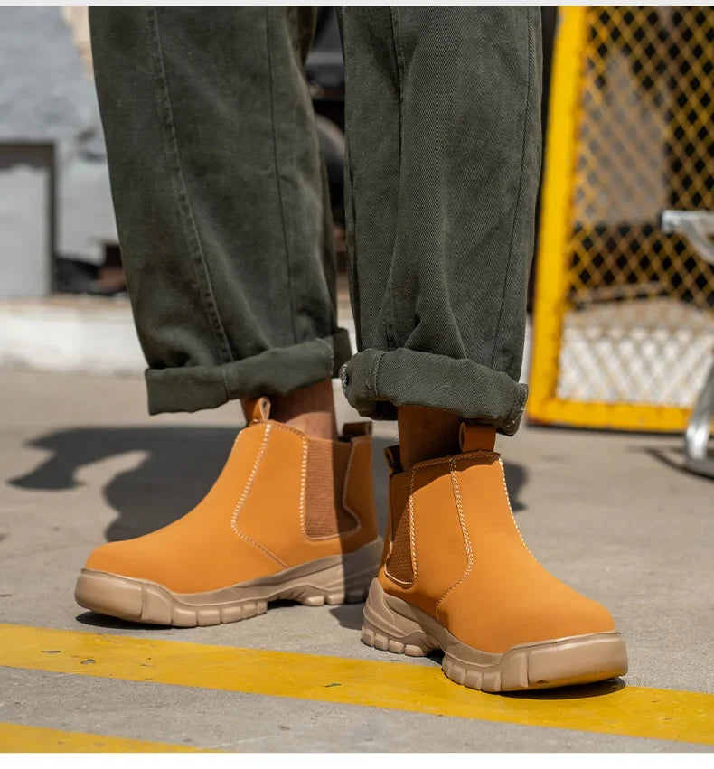 Model standing in tan elastic-sided boots with beige soles, near a yellow mesh fence 7