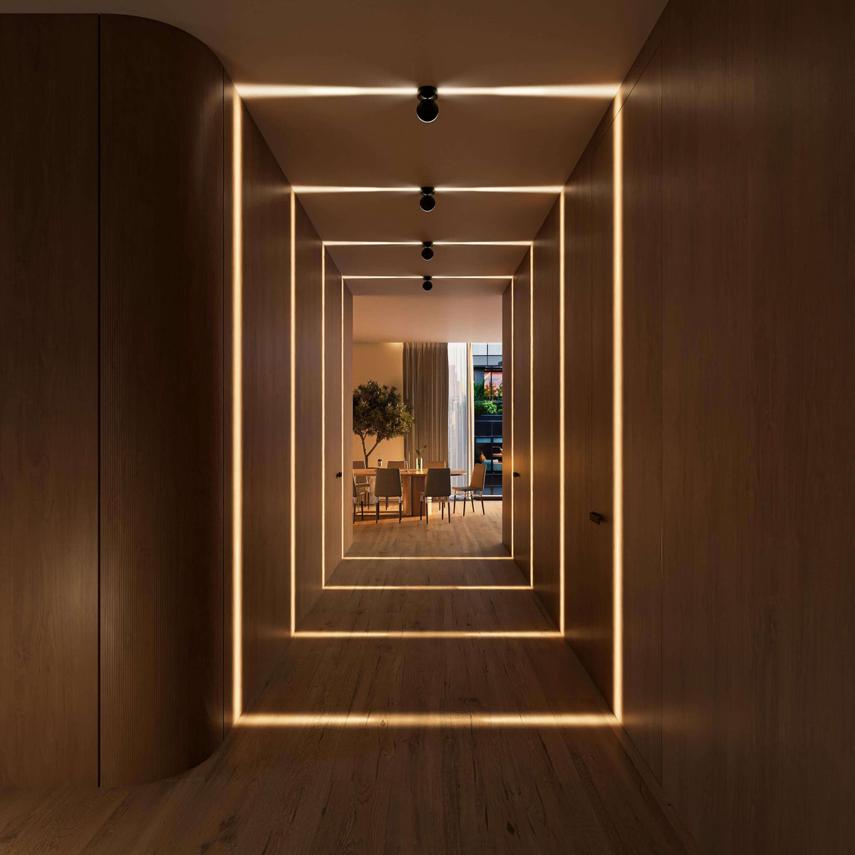 Dimly lit wooden corridor where black ceiling lights project glowing nested rectangles of warm light leading to a dining room. 18