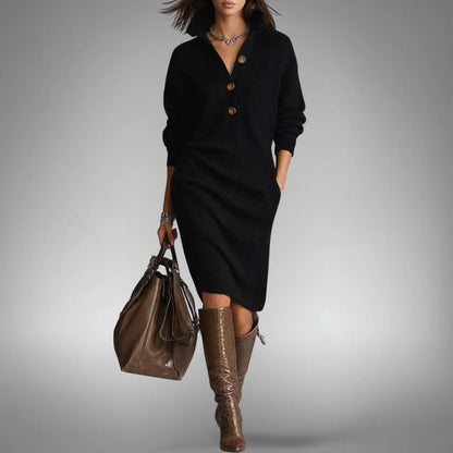 Model walking in the black knitted dress with three buttons, hand in pocket, with brown boots 8