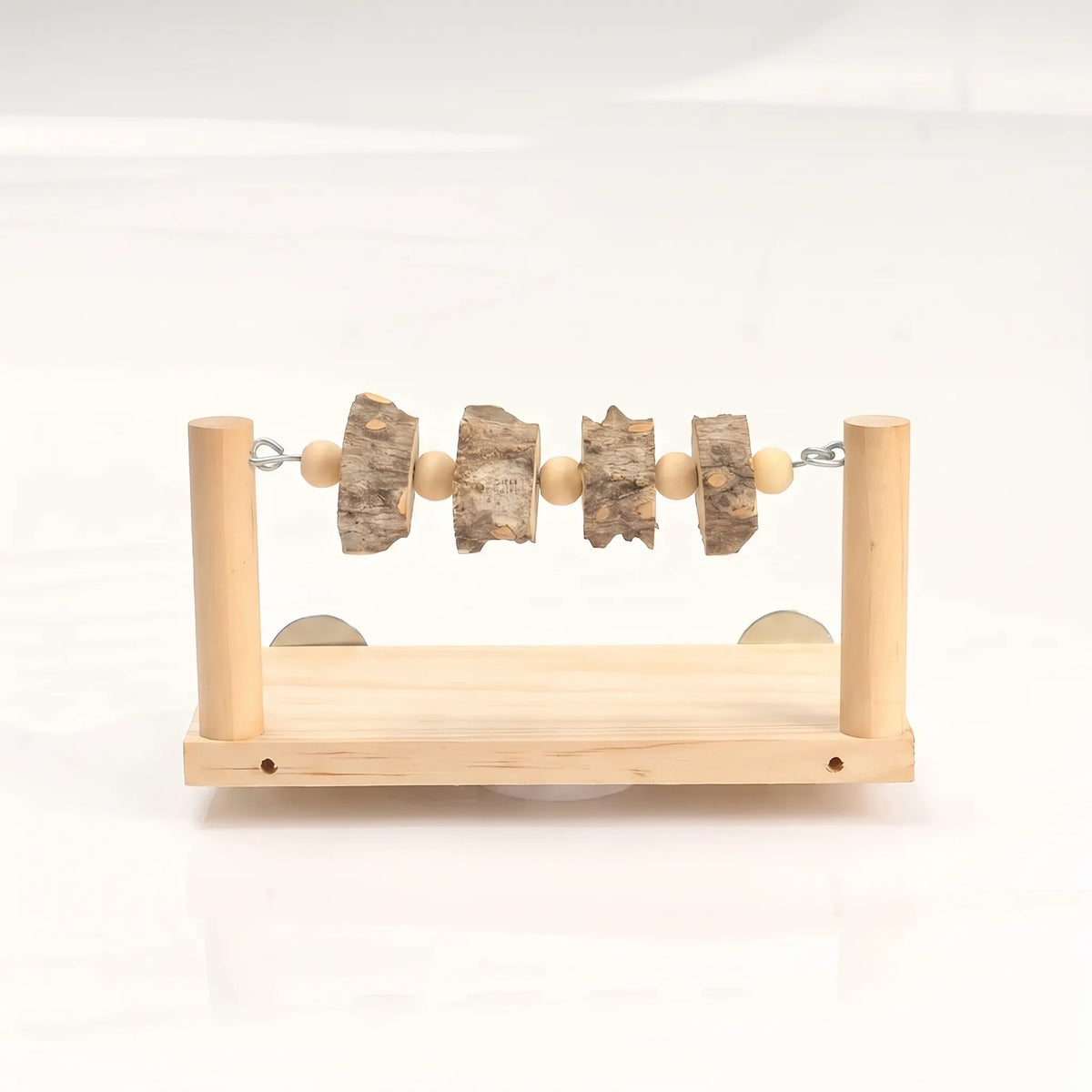 Front view of a wooden perch platform with two upright posts and a rod of bark slices and wooden beads. 1