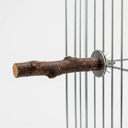 Wooden perch fixed to the vertical bars of a wire cage with a washer and wing nut, against a plain background. 4