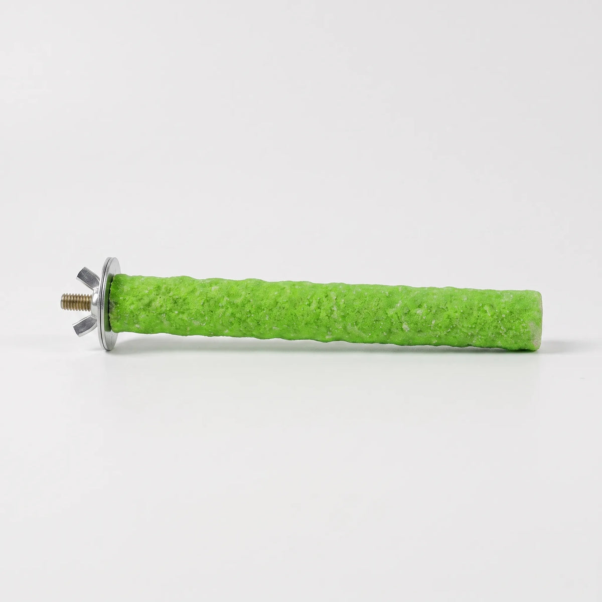 Green gritty-textured perch lying on its side against a plain white background, with a metal washer, wing nut and threaded bolt at one end. 1