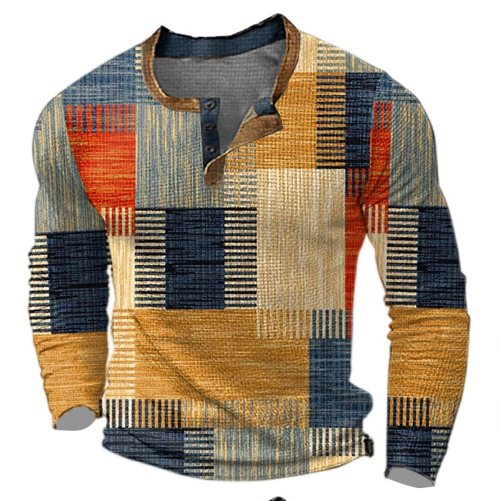 Front view of the long-sleeved Henley top in orange, mustard, navy and cream colour-blocked geometric print with tan-trimmed button placket. 1