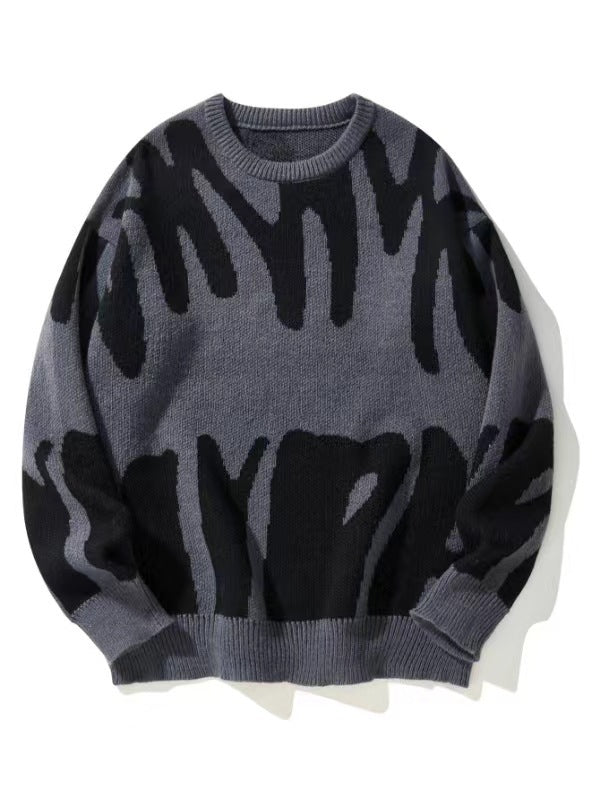 Flat-lay knit jumper in grey with bold black abstract pattern and ribbed cuffs 1