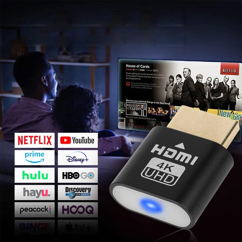 Black HDMI plug in the foreground, with a couple watching a TV series on the sofa and a grid of streaming service logos. 8