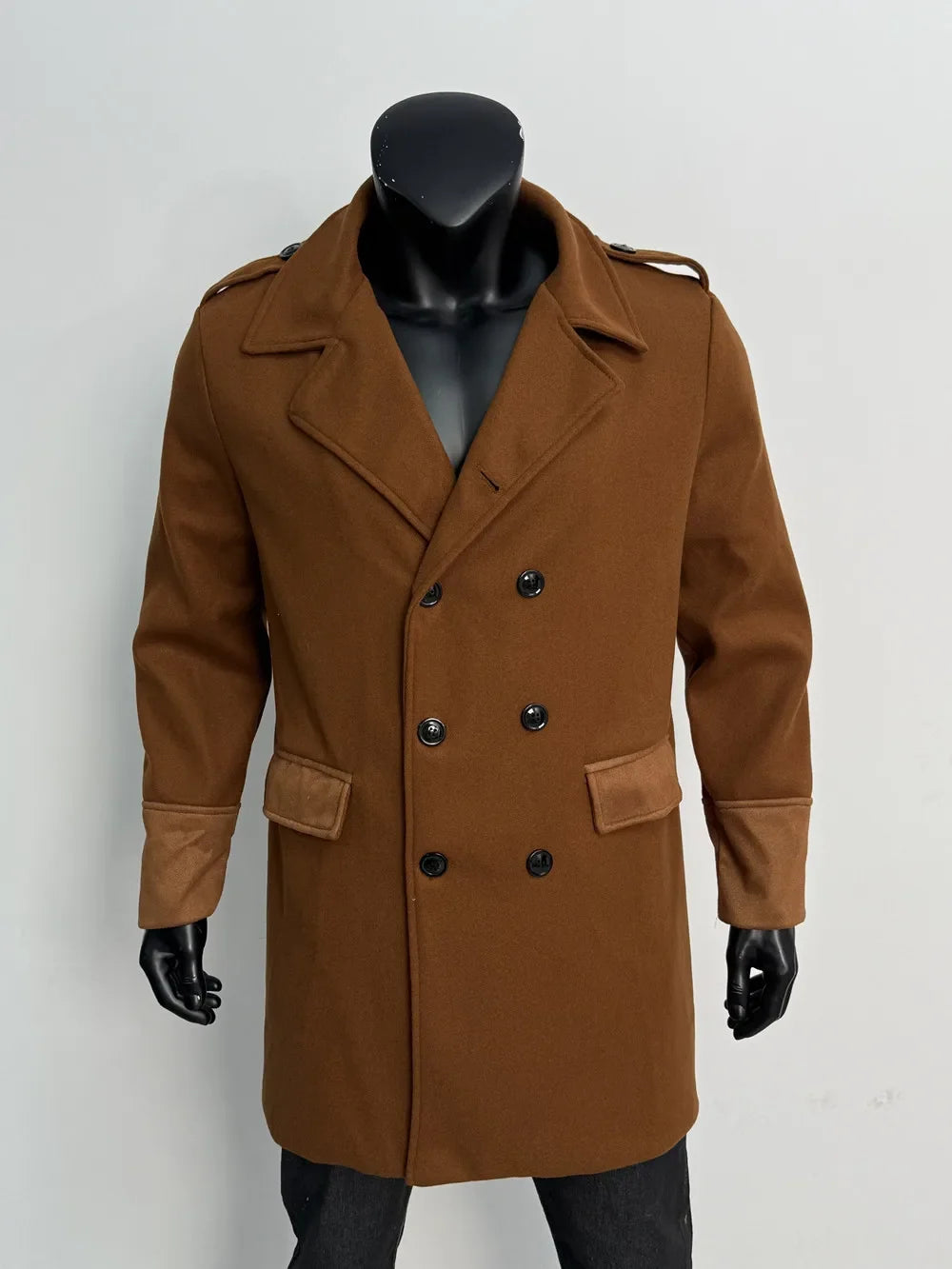 Camel brown double-breasted overcoat on a mannequin, front view with lighter suede-look pocket flaps and cuffs 16
