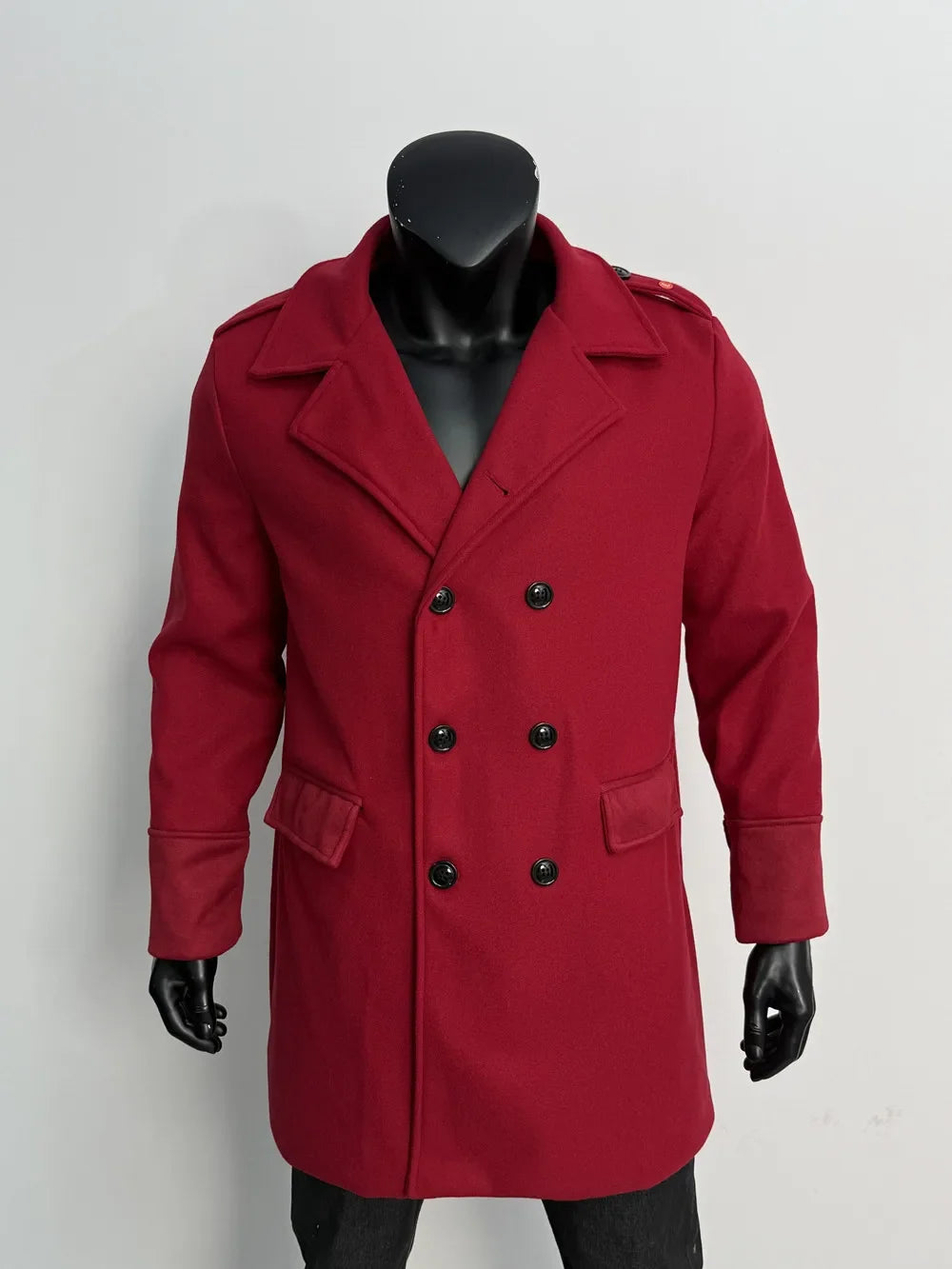 Red double-breasted overcoat on a black mannequin, front view with six black buttons and flap pockets 7