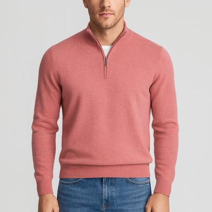 Man wearing the knit in coral pink with a half-zip stand collar and blue jeans 7