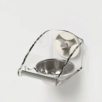 Feeder seen from above and the side, showing the curved clear shield, round steel bowl and a suction cup with hex bolt. 4