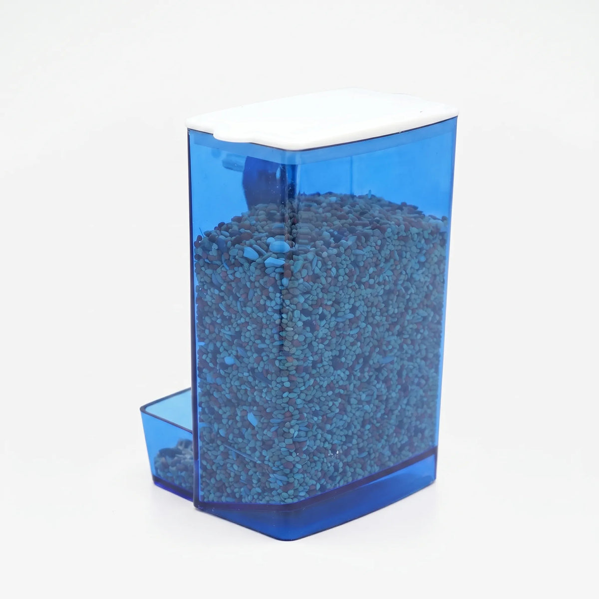 Blue translucent feeder with a white lid, filled to the top with seed and a small tray at the front. 1
