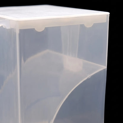 Close-up of the translucent plastic upper corner, showing the white lid edge, small notches and the curved inner panel, against a black background. 3