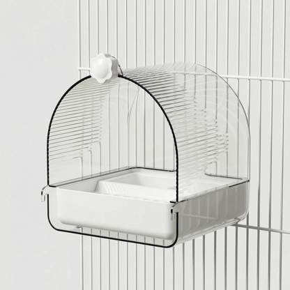 Angled view of the white-based bath attached to white cage bars with a flower-shaped screw knob. 4
