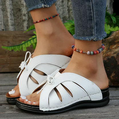 Orthopaedic wedge sandals with a domed button – Mirella
