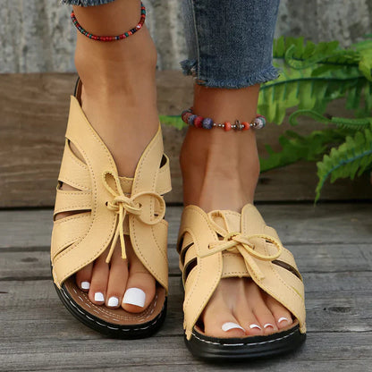 Orthopaedic wedge sandals with a domed button – Mirella
