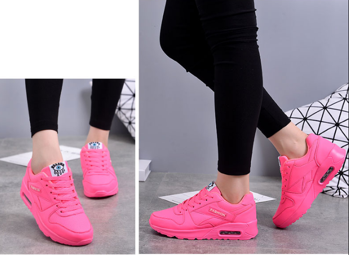 Two close-up views of neon pink trainers worn by a model, one from the front, one from the side 6