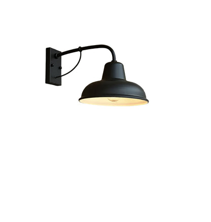 Matt black barn-style wall light with curved arm, rectangular backplate and domed shade with a pale interior, shown on a white background. 1