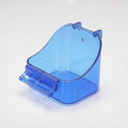 Translucent blue plastic bath with a curved high back, two hooks at the top and a small perch bar at the front, on white. 1