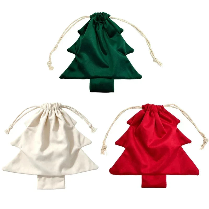Flat lay of green, cream and red tree-shaped drawstring bags with cream cotton cords on white 5