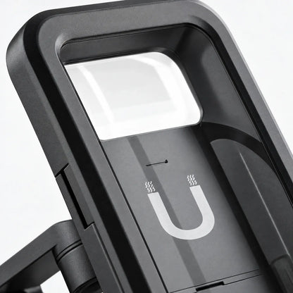 Close-up of the mount's black casing and clear window, with a magnet symbol on the back panel. 3