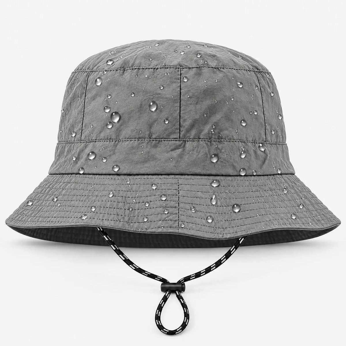 Front view of the grey bucket hat with water droplets on the fabric and a black-and-white drawcord looped below the brim. 2