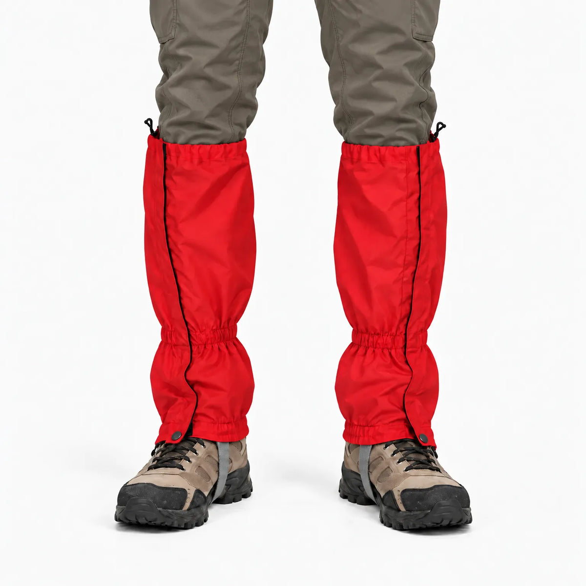 Front view of red gaiters with black side zips, worn over olive trousers and brown walking boots against a white background. 8