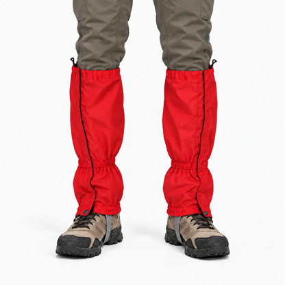 Front view of red gaiters with black side zips, worn over olive trousers and brown walking boots against a white background. 8