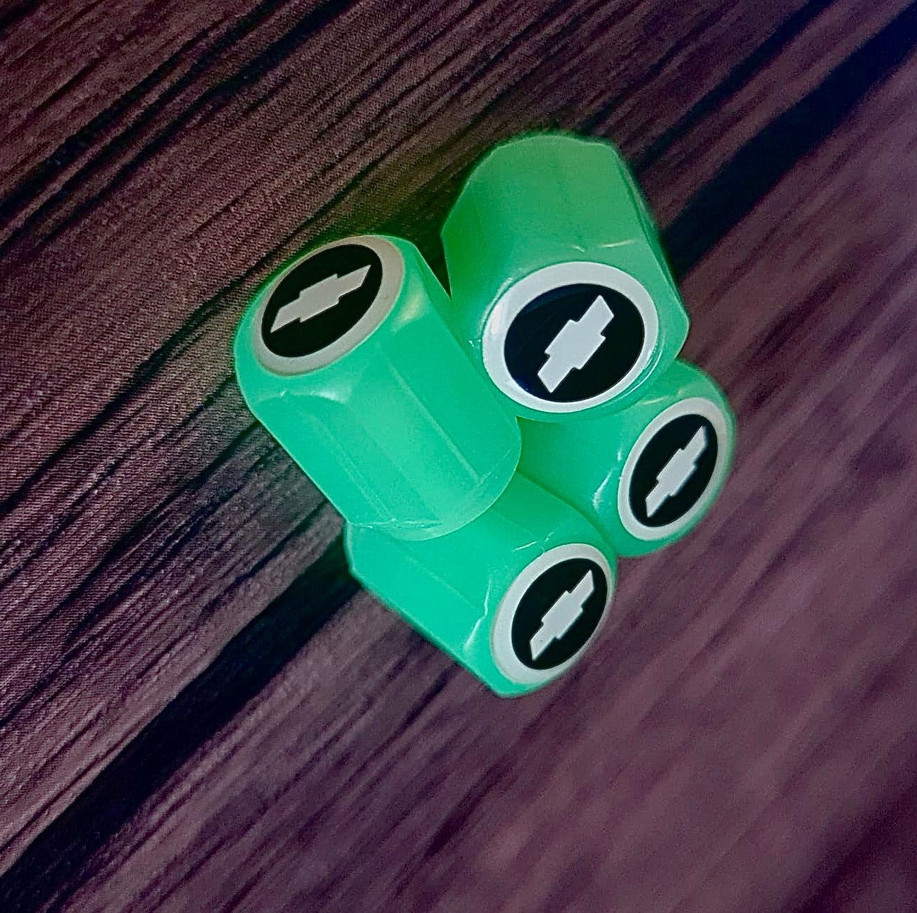 Set of 4 Glow-in-the-Dark Valve Caps with Logo – LuxaGlow