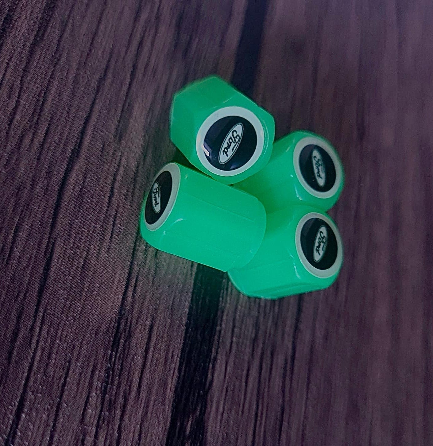 Set of 4 Glow-in-the-Dark Valve Caps with Logo – LuxaGlow
