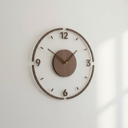 Clear acrylic wall clock with walnut-toned arc rim, raised numerals and round centre disc on a pale wall 1