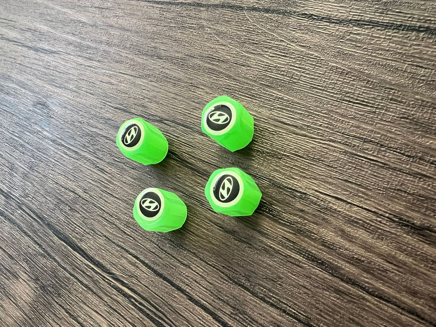 Set of 4 Glow-in-the-Dark Valve Caps with Logo – LuxaGlow