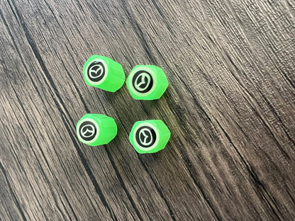Set of 4 Glow-in-the-Dark Valve Caps with Logo – LuxaGlow