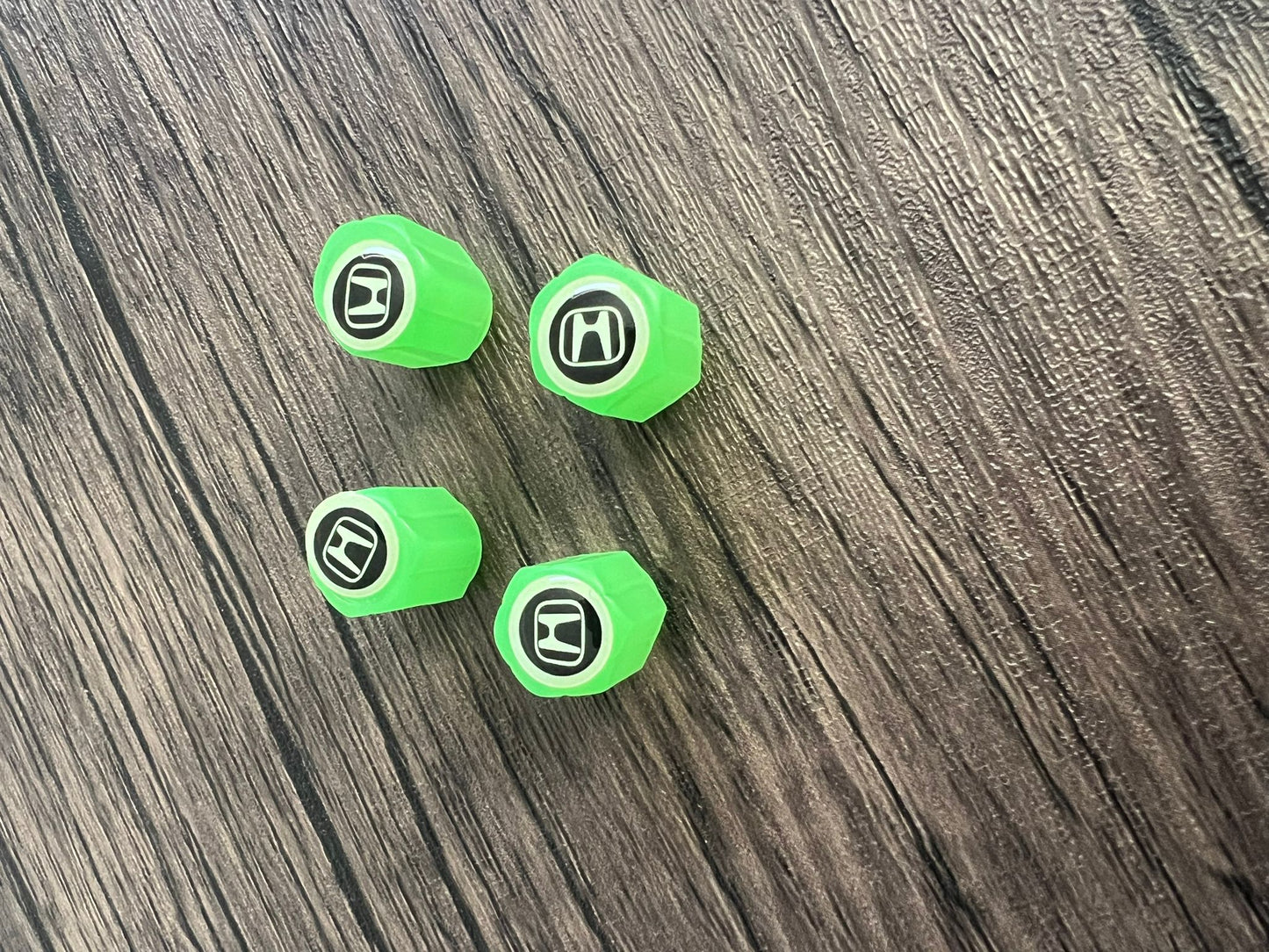 Set of 4 Glow-in-the-Dark Valve Caps with Logo – LuxaGlow
