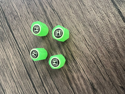 Set of 4 Glow-in-the-Dark Valve Caps with Logo – LuxaGlow