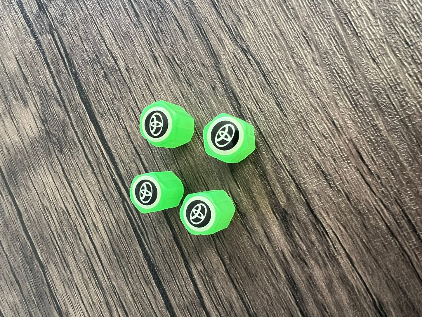 Set of 4 Glow-in-the-Dark Valve Caps with Logo – LuxaGlow